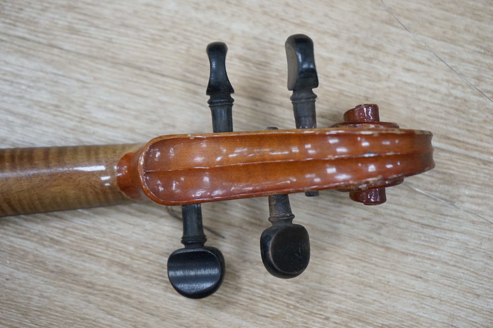 An early 20th century German violin, bearing a Stradivarius label, with case.